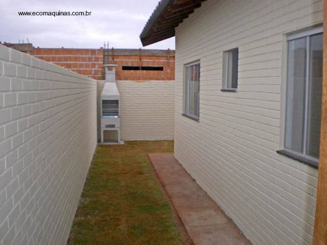Vivienda familiar de bajo costo pero de terminaciones de calidad Casa económica terminada construida con bloques de tierra comprimida en Brasil