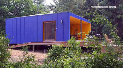 Un módulo cuadrilátero de madera moderno separado del suelo Modelo de casa modular Weehouse de Estados Unidos