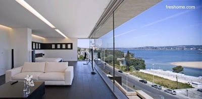 Open plan y paredes de vidrio Amplio espacio interior abierto de una vivienda contemporánea