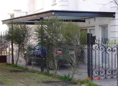 Portón y techado de herrería artística Cobertizo