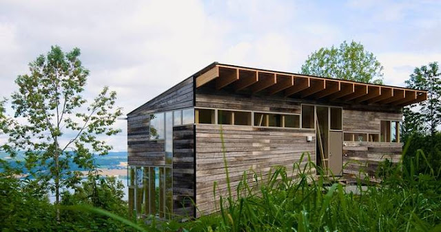 Cabaña sobre pendiente Foto 4